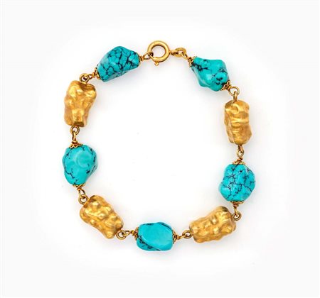 Bracciale a pepite in oro e turchese Oro giallo 750/000. Peso complessivo gr....