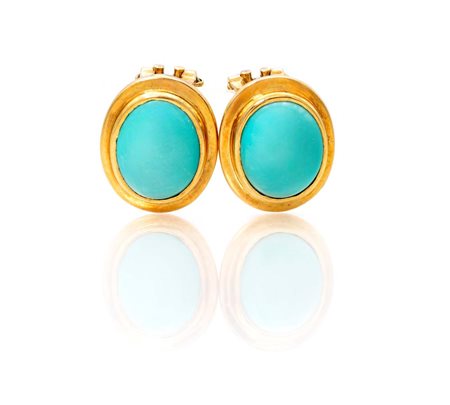 Coppia di orecchini in oro e turchese Oro giallo 750/000. Peso complessivo...