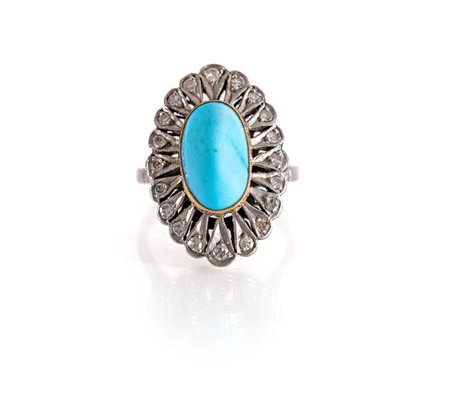 Anello in oro, turchese e diamanti Oro bianco 750/000. Peso complessivo gr....