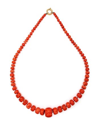 Collana in corallo ed oro Oro giallo 750/000. Corallo in taglio barilotto da...
