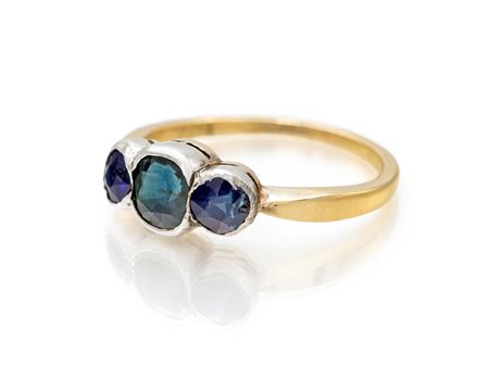 Anello trilogy in oro e zaffiri Oro giallo e bianco 750/000. Peso complessivo...