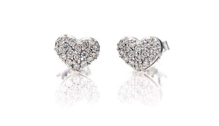 Coppia di orecchini a cuore in oro e brillanti Oro bianco 750/000. Peso...