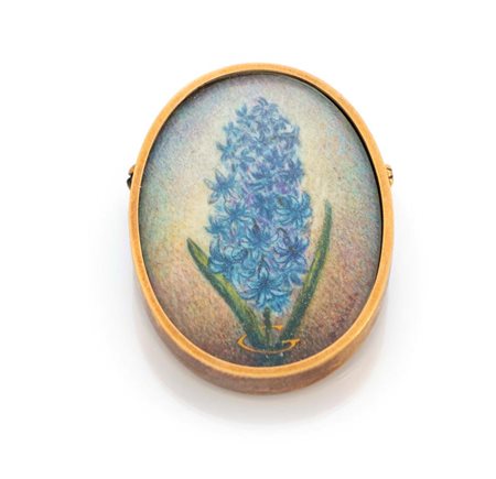 Spilla in oro e miniatura Oro giallo 750/000. Peso complessivo gr. 10 cm 3,5...