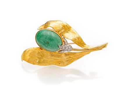 Spilla in oro, brillanti e turchese Oro giallo 750/000. Peso complessivo gr....