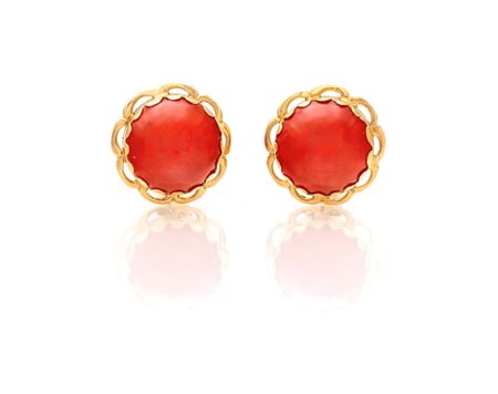 Coppia di orecchini in oro e corallo Oro giallo 750/000. Spola in corallo...