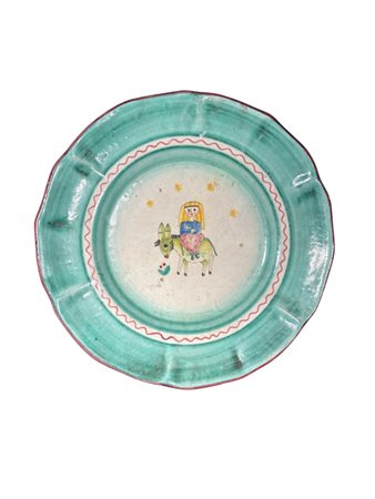 Decorata con figura femminile su asinello. Siglata sotto la base. C.S.A....