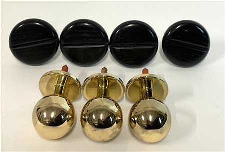 Lotto composto da quattro appendiabiti in legno verniciato nero di Ingo Maurer