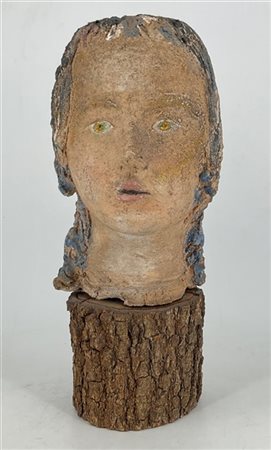 Mario Porcu "Volto femminile" 
scultura in terracotta dipinta su base in legno
h