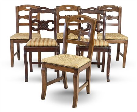 Lotto composto da gruppo di quattro sedie con schienali a giorno e cartella int