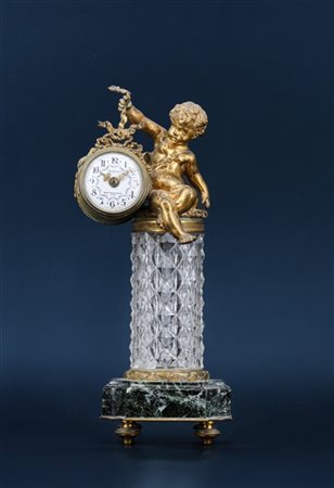 Janetti.
Orologio da scrivania in foggia di colonna in marmo verde Alpi e fusto