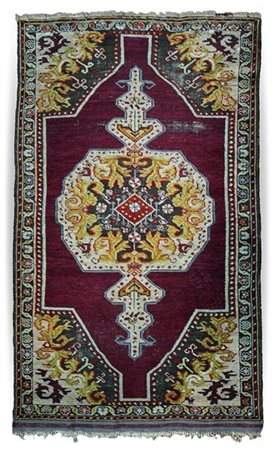 Tappeto Ghiordes, Anatolia, inizio secolo XX. Decoro con grande medaglione con