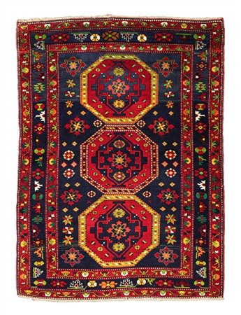 Tappeto Jagi Bedir, Anatolia, secolo XX. Decoro con tre medaglioni ottagonali c