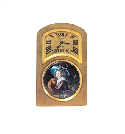 Wegelin. 
Orologio in bronzo dorato decorato da placca in smalto raffigurante g