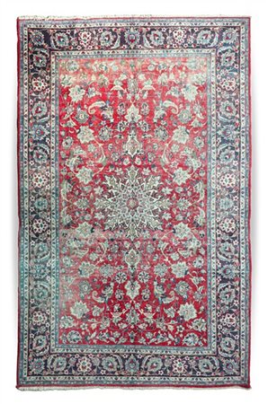 Tappeto Sarouk, Persia, secolo XX. Decoro con medaglione stellato e rami fiorit