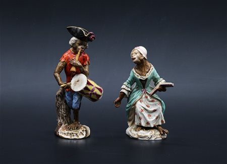Manifattura di Meissen, secolo XIX. Due figurette in porcellana policroma con p
