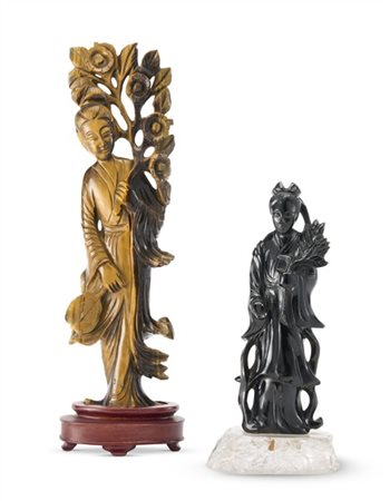 Due figure femminili rispettivamente in pietra dura scura ed occhio di tigre.