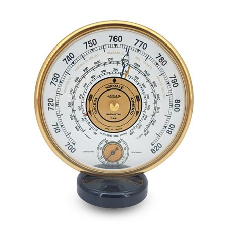 Jaeger. 
Barometro da scrivania in materiale plastico e ottone con indicazione