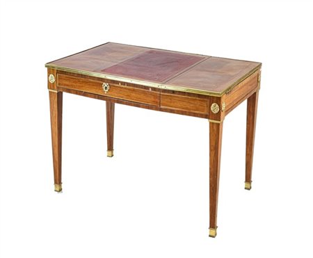 Scrittoio da centro lastronato e filettato in legni di varie essenze, fronte a