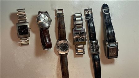 Lotto composto da 4 orologi Dunhill insieme ad un orologio Gucci e da un Enigma