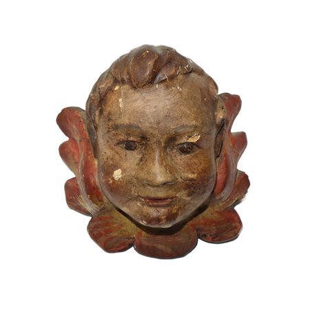 Testa di zefiro scolpita e intagliata in legno e dipinta policroma, 17° secolo