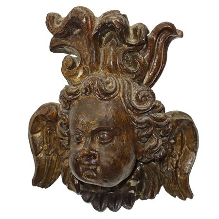 Testa di zefiro scolpito e intagliato su legno, 17° secolo