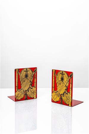 Piero Fornasetti (Milano 10/11/1913 - Milano 09/10/1988)  - Coppia di fermalibri, decoro strumenti musicali, 1960 circa