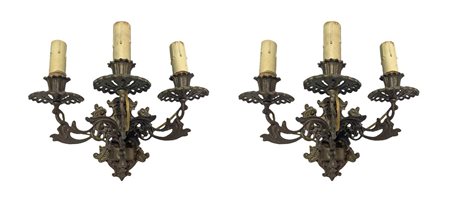 Coppia di appliques in bronzo dorato a tre luci