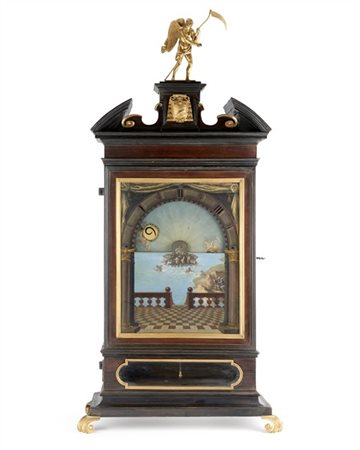 Orologio del tipo "notturno" con cassa a edicola in legno a profili ebanizzati