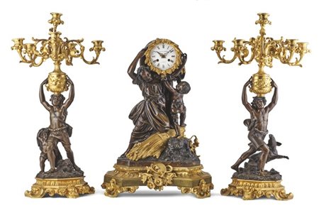 Lerolle Frères a Paris.
Trittico da camino composto da due candelabri a sei luc