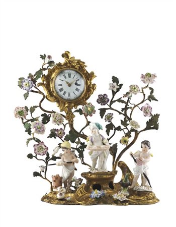 Gilles Martinot.
Orologio in bronzo dorato formato da una scena bucolica compos