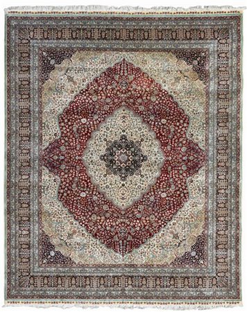 Tappeto Tabriz, Persia, secolo XX. Annodato in seta. Decoro con medaglione flor