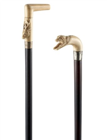 Arte del secolo XIX. Lotto composto da due bastoni da passeggio con presa sagom