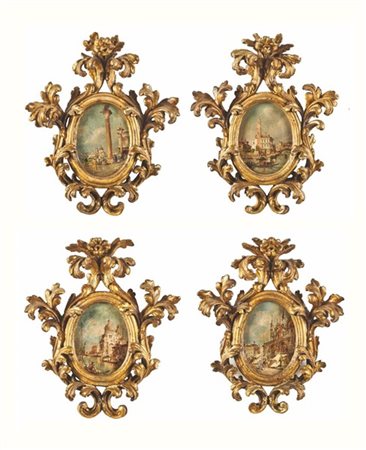 Gruppo di quattro cornici in legno intagliato e dorato di forma ovale con bordu