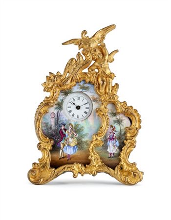 Orologio a paravento in bronzo dorato e placche in smalti policromi a soggetto