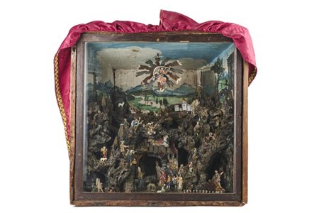 Arte del secolo XIX. Teca lignea con tendaggi applicati contenente presepe con
