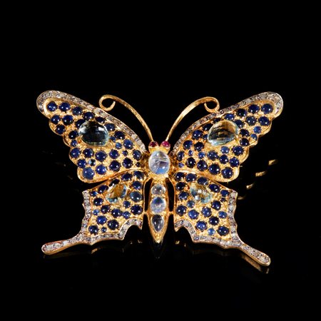  
Spilla in argento dorato 
 