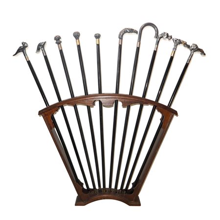 Rastrelliera con numero 10 bastoni con impugnatura con soggetti vari in argento 925