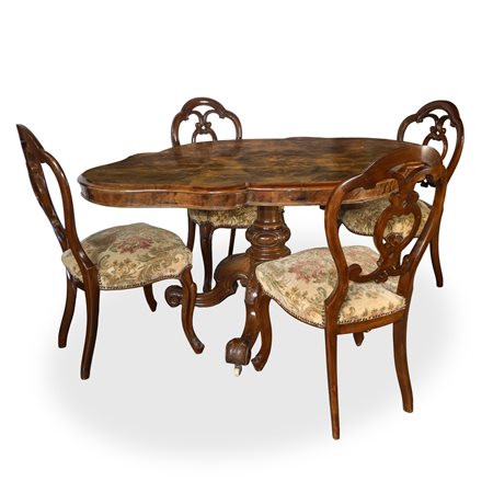 Tavolo a biscotto con piano in radica di noce e piede a 4 razze con rotelle con 5 sedie in tessuto floreale e legno di noce, fine 19° secolo