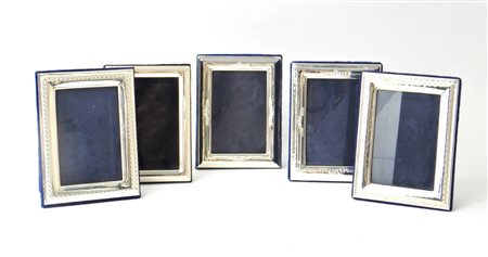 Gruppo di cinque cornici in argento 800