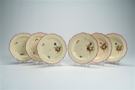 Sei piatti in terraglia smaltata con decoro floreale. Manifattura G. Baroni, inizio secolo XIX