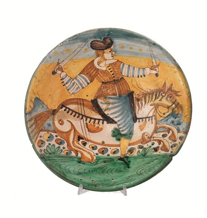 PIATTO, MONTELUPO, FINE SECOLO XVIIdi maiolica,la forma svasata, con orlo...