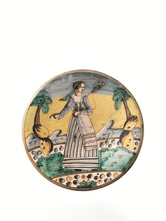 PIATTO, MONTELUPO, FINE SECOLO XVIIin maiolica, la forma svasata, con orlo...