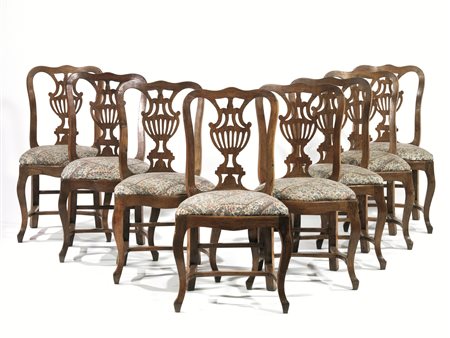 OTTO SEDIE, TOSCANA, FINE SECOLO XVIIIin noce intagliato a patina bionda,...