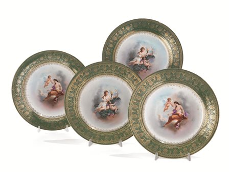 QUATTRO PIATTI, MANIFATTURA DI VIENNA, SECOLO XIXin porcellana policroma...