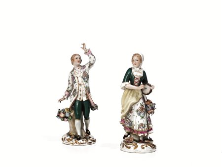 DUE STATUINE, MANIFATTURA DI CAPODIMONTE, SECOLO XIXin porcellana policroma...