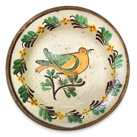 Piatto in maiolica di Caltagirone dipinto policromo con uccello sul fronte e decori lungo il bordo, fine 19° secolo