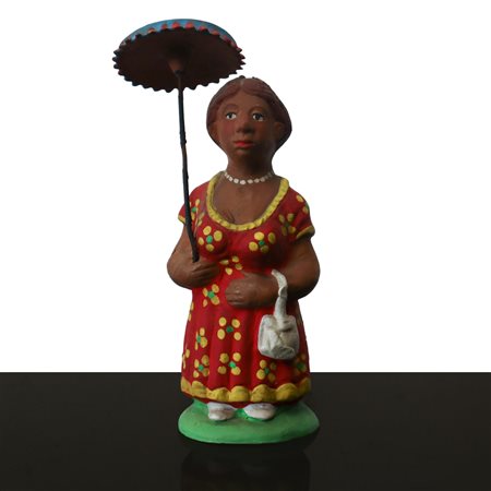 Fischietto a guisa di signora con ombrello