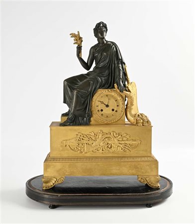 Orologio in bronzo dorato e brunito, Francia, epoca Impero cm 54x37x15 - base...