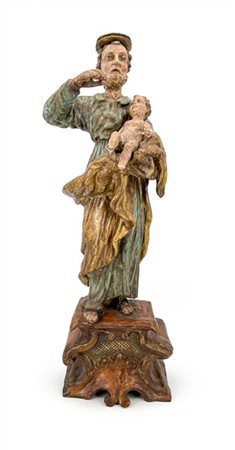 Scultura raffigurante San Giuseppe col Bambino in legno intagliato, laccato in