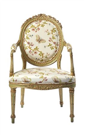 Poltrona in legno intagliato, laccato e dorato, schienale ovale sormontato da n